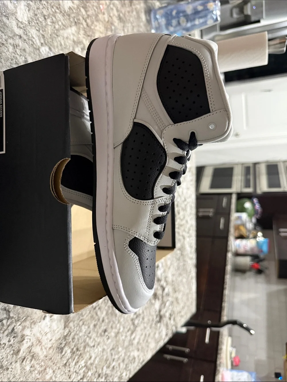 Jordan Black and White Mid-Top Basketball Sneakers